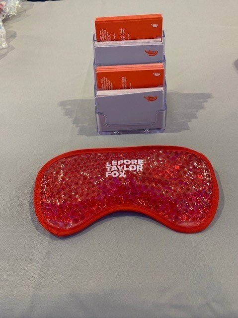 Lepore Taylor Fox branded business cards and eye masks.